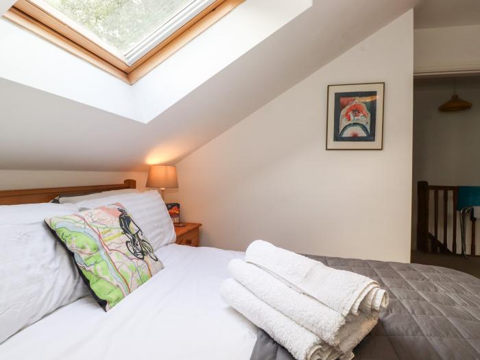 Cherry Tree Cottage is in Windermere, Cumbria. Two-bedroom cottage in National Park. Near amenities.