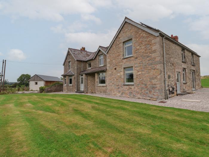 Segrwyd Uchaf in Denbigh, Denbighshire. Five-bedroom home with games room and EV charger. Near AONB.