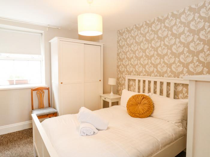 Apartment 12 Trinity Mews, in Torquay, Devon. Ground-floor apartment near beach and amenities. Pets.