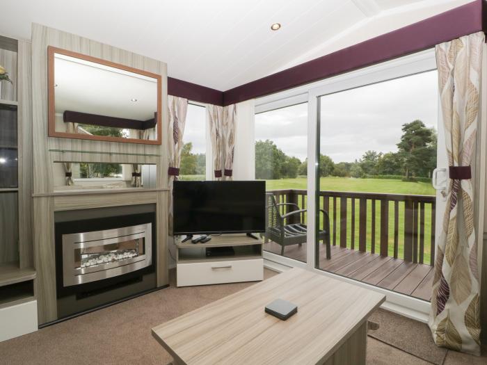 Swan, Pearl Lake Holiday Park, Shobdon, Herefordshire. Two bedrooms. Single-storey. Enc decking.