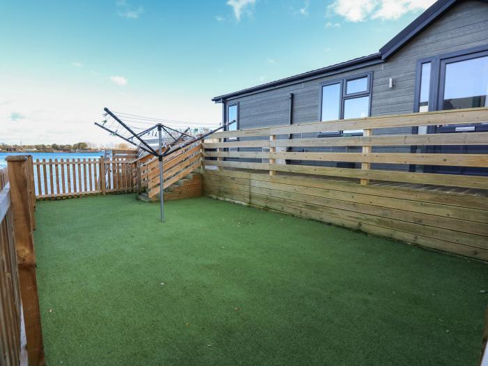 Lake View Lodge, Tallington, Lincolnshire. Lake views. Pet-friendly. On-site facilities. Hot tub. TV