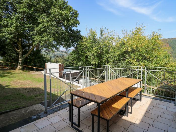 The Coach House at Plas Dolguog, in Machynlleth. Five-bedroom home with hot tub and enclosed garden.