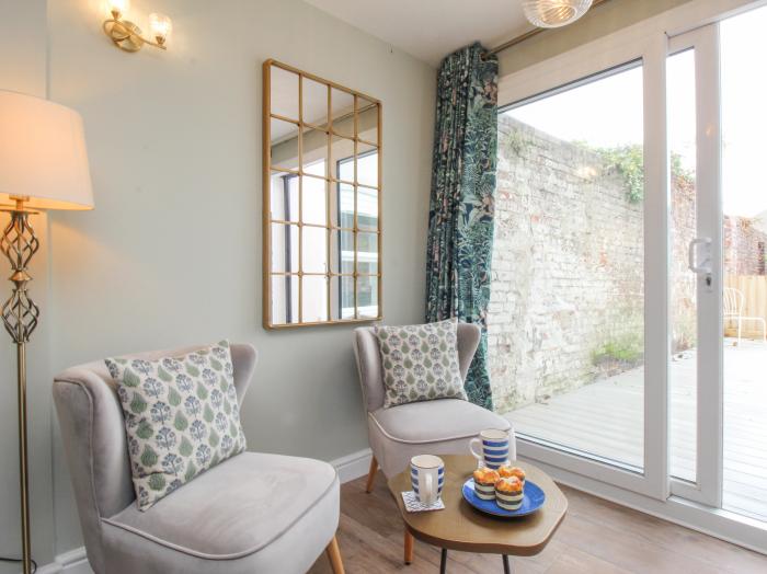 Bay Cottage, Weymouth, Dorset. Set over three floors. Central location close to amenities and beach.