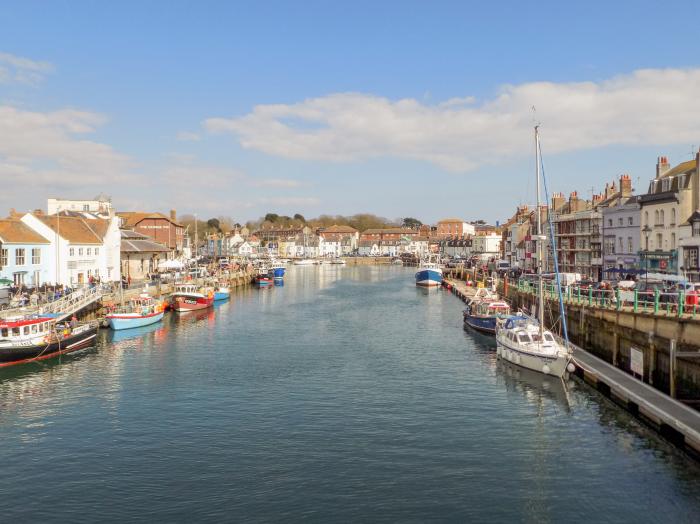 Bay Cottage, Weymouth, Dorset. Set over three floors. Central location close to amenities and beach.