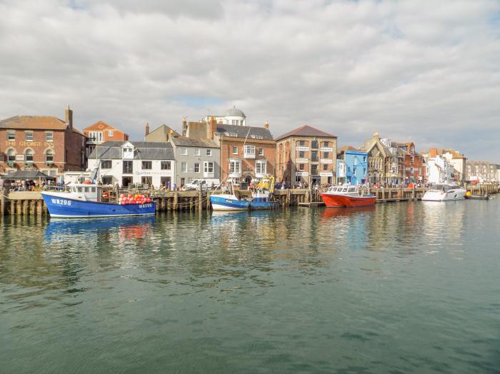 Bay Cottage, Weymouth, Dorset. Set over three floors. Central location close to amenities and beach.