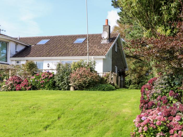 Little Roskrow, is near Falmouth, Cornwall. One-bedroom annexe, ideal for couples. Sea views. Rural.