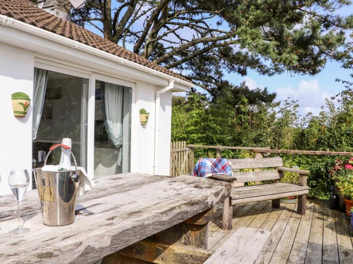 Little Roskrow, is near Falmouth, Cornwall. One-bedroom annexe, ideal for couples. Sea views. Rural.