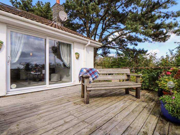 Little Roskrow, is near Falmouth, Cornwall. One-bedroom annexe, ideal for couples. Sea views. Rural.