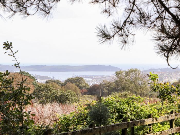 Little Roskrow, is near Falmouth, Cornwall. One-bedroom annexe, ideal for couples. Sea views. Rural.