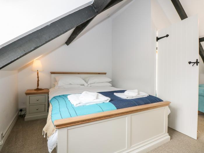 Leveret Cottage is in Docking, Norfolk. Close to amenities. Romantic. Couples. Bedroom with en-suite