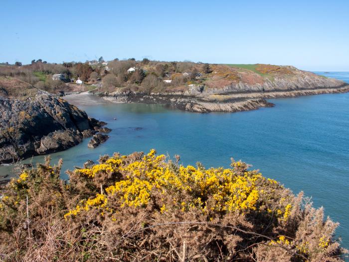 West Lighthouse Keeper's Cottage near Amlwch. Three-bedroom bungalow with sea views. Coastal. Patio.