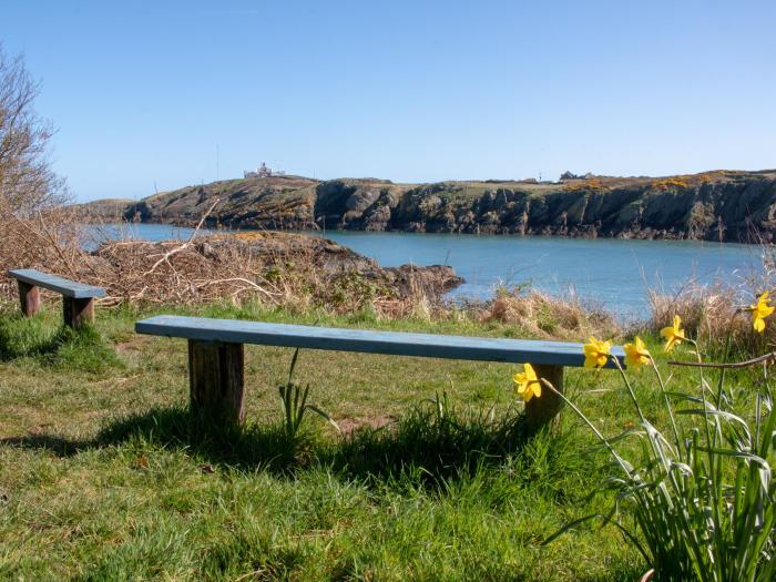 West Lighthouse Keeper's Cottage near Amlwch. Three-bedroom bungalow with sea views. Coastal. Patio.