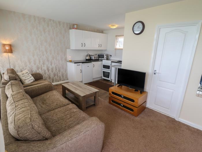 107 The Laurels, in Chapel St Leonards, Lincolnshire. Two-bed chalet near amenities and beach. Pets.