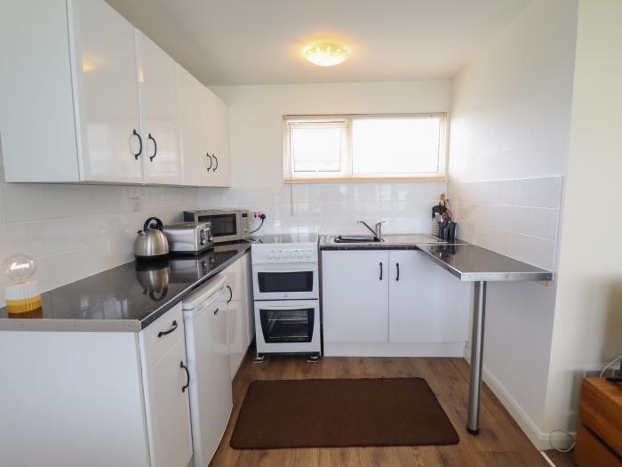 107 The Laurels, in Chapel St Leonards, Lincolnshire. Two-bed chalet near amenities and beach. Pets.