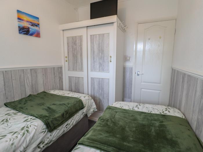 107 The Laurels, in Chapel St Leonards, Lincolnshire. Two-bed chalet near amenities and beach. Pets.