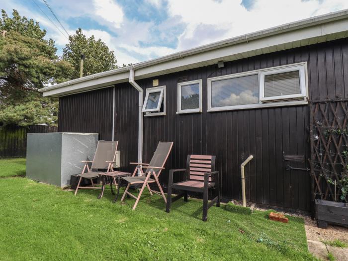 107 The Laurels, in Chapel St Leonards, Lincolnshire. Two-bed chalet near amenities and beach. Pets.