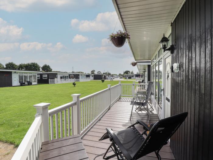 107 The Laurels, in Chapel St Leonards, Lincolnshire. Two-bed chalet near amenities and beach. Pets.