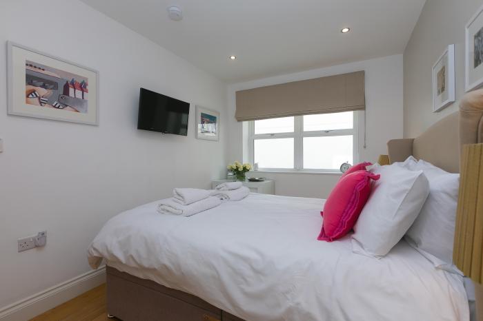 2 Four Seasons is in Carbis Bay, in Cornwall. Ground-floor apartment, ideal for families. Near beach