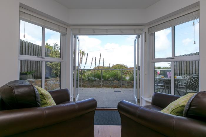 2 Four Seasons is in Carbis Bay, in Cornwall. Ground-floor apartment, ideal for families. Near beach