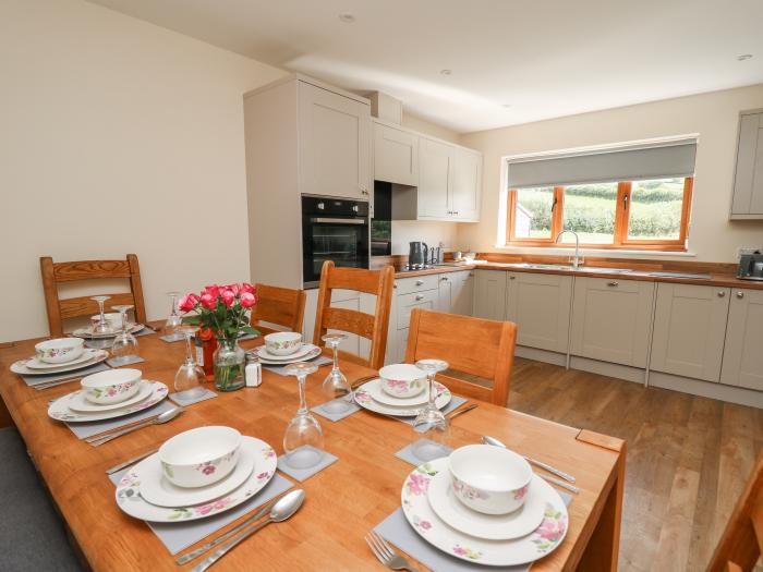 Awel y Bryn, is in Rhayader, Powys. Four-bedroom home enjoying rural views. Enclosed garden. Family.