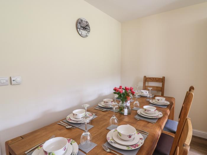 Awel y Bryn, is in Rhayader, Powys. Four-bedroom home enjoying rural views. Enclosed garden. Family.