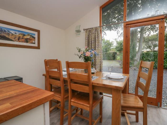 Bay Tree Lodge, Cartmel, Cumbria. Single-storey. Woodburning stove. Decking with furniture. Smart TV