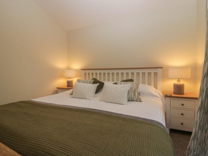 Bay Tree Lodge, Cartmel, Cumbria. Single-storey. Woodburning stove. Decking with furniture. Smart TV