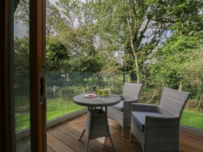 Bay Tree Lodge, Cartmel, Cumbria. Single-storey. Woodburning stove. Decking with furniture. Smart TV