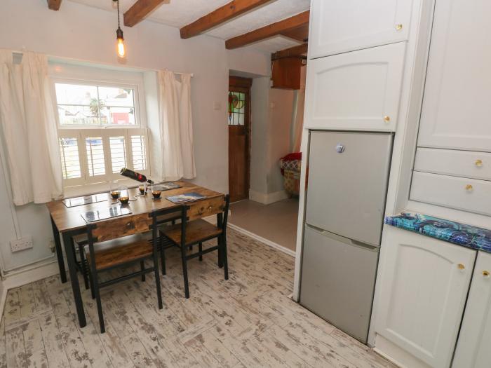 Cobwebs Corner is in Porthcawl, Bridgend. Three-bedroom home resting near beach and amenities. Pets.