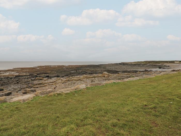 Cobwebs Corner is in Porthcawl, Bridgend. Three-bedroom home resting near beach and amenities. Pets.