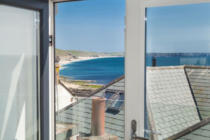 The Loft is in Porthleven, Cornwall. One-bedroom bolthole, ideal for couples. Sea views. Near beach.