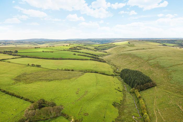 Hangley Cottage, in Simonsbath, Somerset. Charming, three-bedroom property. Woodburning stove. WiFi.