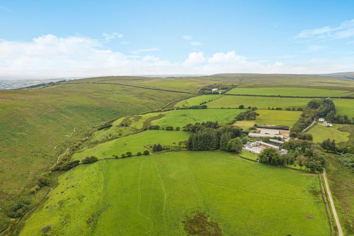 Hangley Cottage, in Simonsbath, Somerset. Charming, three-bedroom property. Woodburning stove. WiFi.