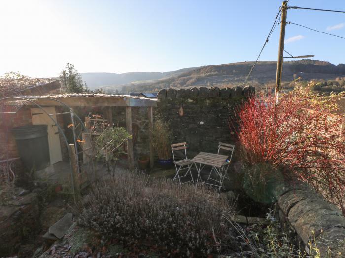 Hillside Holiday Cottage, Pentre, Rhondda Cynon Taff, Wales. Woodburning stove. Near a National Park