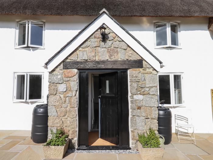 2 Coldeast Cottages, is near Newton Abbot, Devon. Two-bedroom, Grade II listed cottage. Rural views.