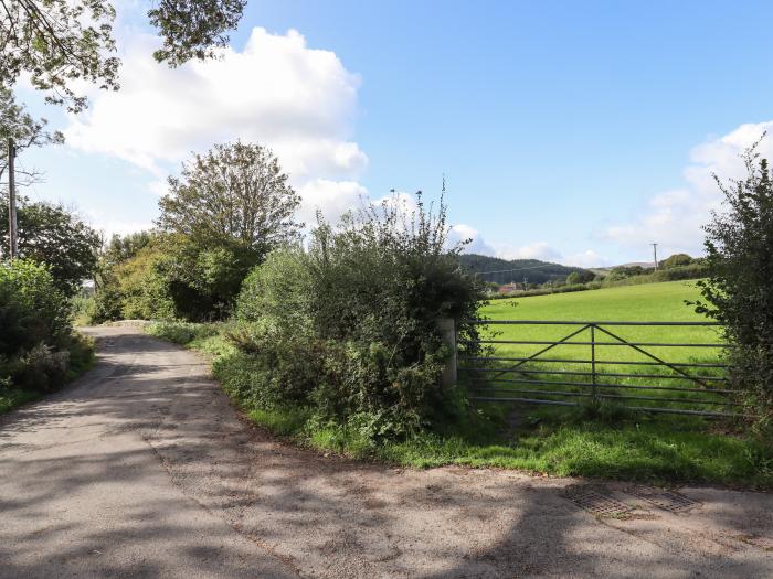 2 Coldeast Cottages, is near Newton Abbot, Devon. Two-bedroom, Grade II listed cottage. Rural views.