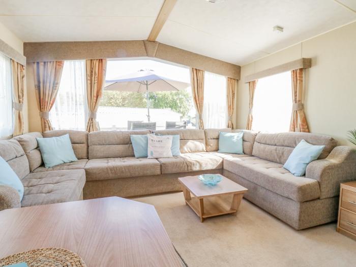 E10 Eagle Meadows in Paignton, Devon. Open-plan living space. Shared indoor and outdoor heated pool.