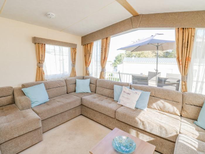 E10 Eagle Meadows in Paignton, Devon. Open-plan living space. Shared indoor and outdoor heated pool.