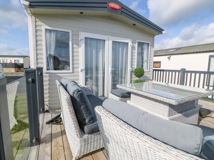 Seafront Holiday Home 1, Pwllheli. Three-bedroom lodge, enjoying sea views. Near amenities and beach