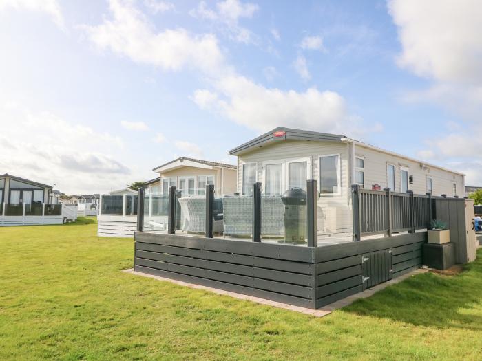 Seafront Holiday Home 1, Pwllheli. Three-bedroom lodge, enjoying sea views. Near amenities and beach