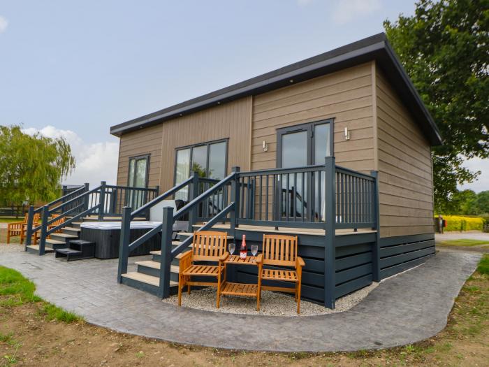 Bowes Hideaway, is near Eppleby, Durham. One-bedroom lodge, ideal for couples. Hot tub. Rural views.