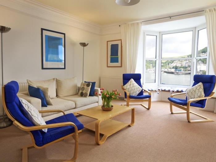 Harbourside, is in Dartmouth, Devon. First-floor apartment with sea views. Near amenities and beach.