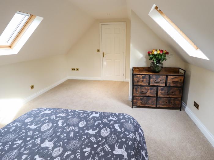 Woodland Lodge in Frithville, Boston, Lincolnshire. Dog-friendly. Romantic. Woodburning stove.