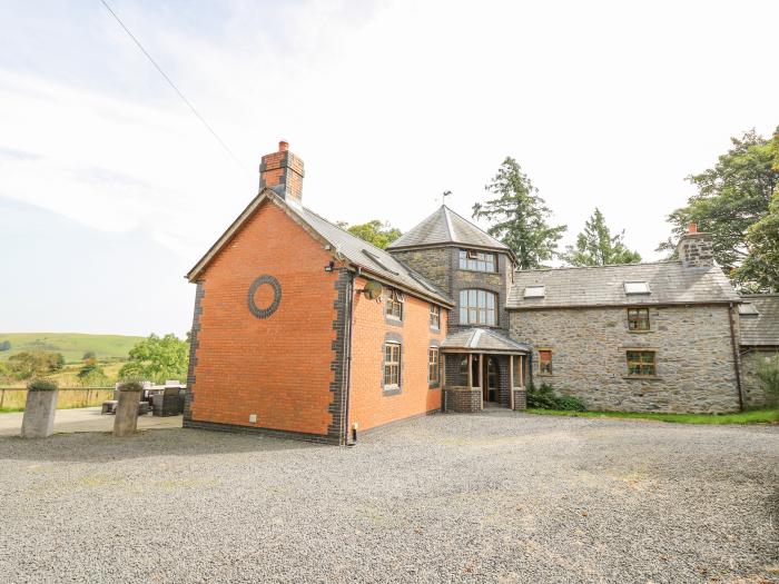 Nanthir nearby Rhayader, Powys. Set in spacious grounds. Over three floors. Five bedrooms & hot tub.