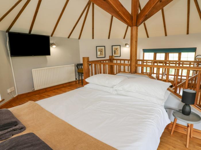 Nanthir nearby Rhayader, Powys. Set in spacious grounds. Over three floors. Five bedrooms & hot tub.