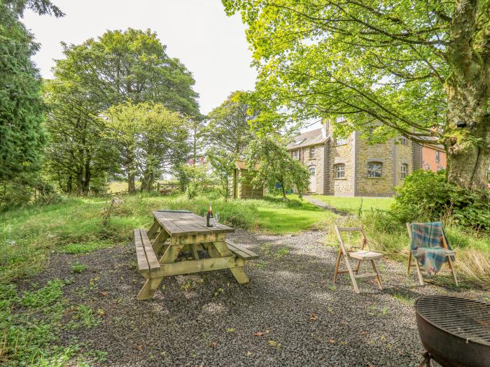 Nanthir nearby Rhayader, Powys. Set in spacious grounds. Over three floors. Five bedrooms & hot tub.