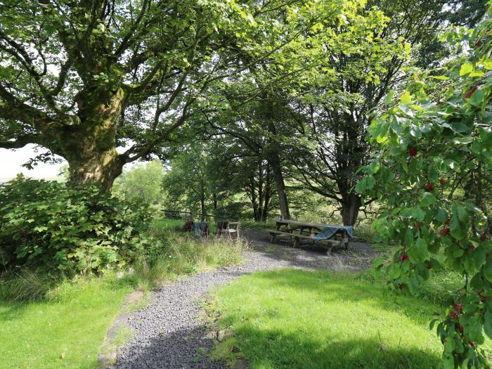 Nanthir nearby Rhayader, Powys. Set in spacious grounds. Over three floors. Five bedrooms & hot tub.