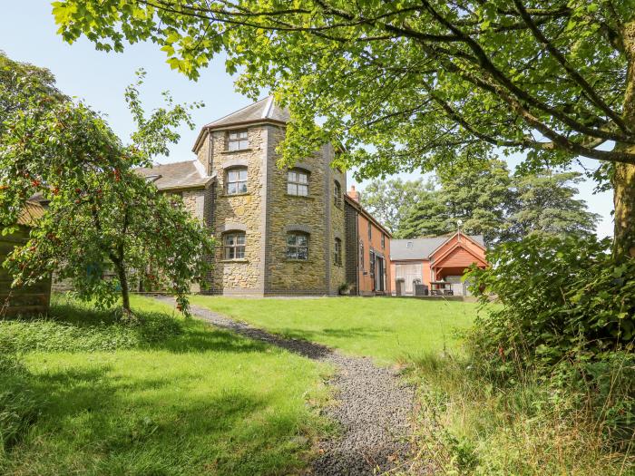 Nanthir nearby Rhayader, Powys. Set in spacious grounds. Over three floors. Five bedrooms & hot tub.