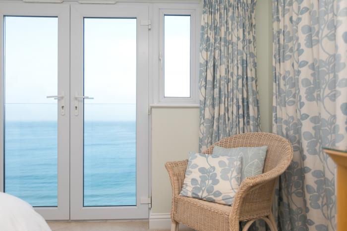 Wavetop is in Carbis Bay, Cornwall. Penthouse apartment with stunning sea views. Near beach. Stylish