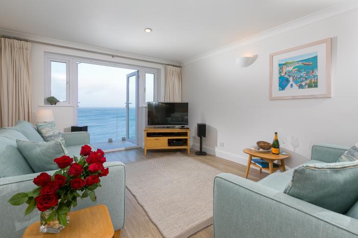 Wavetop is in Carbis Bay, Cornwall. Penthouse apartment with stunning sea views. Near beach. Stylish